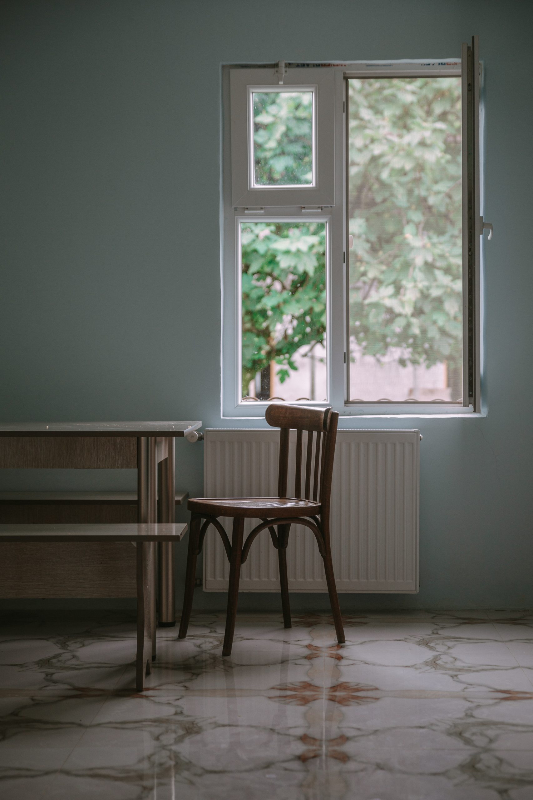 White Window and a chair and table